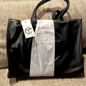 Small Telfar shopping bag.